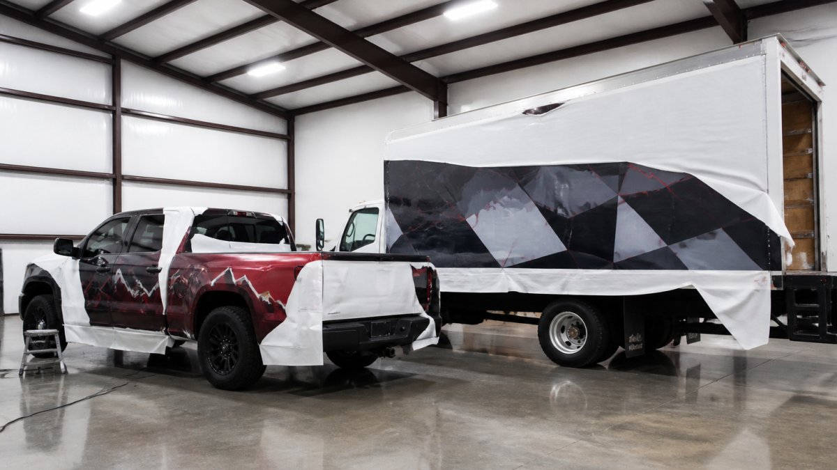 Diagram comparing the surface area of a pickup and box truck for custom truck wraps pricing.